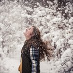 Girl smiling in the snow