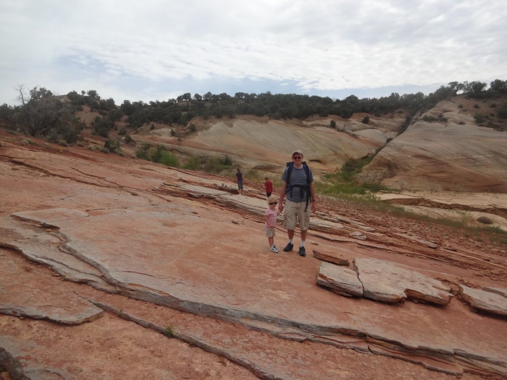 family on red rock