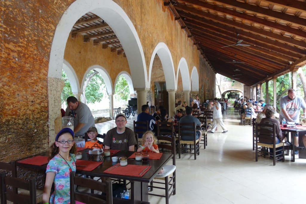 family sitting at a dining table