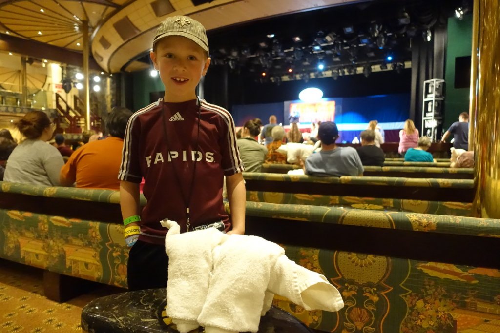 boy with towel folded like an animal