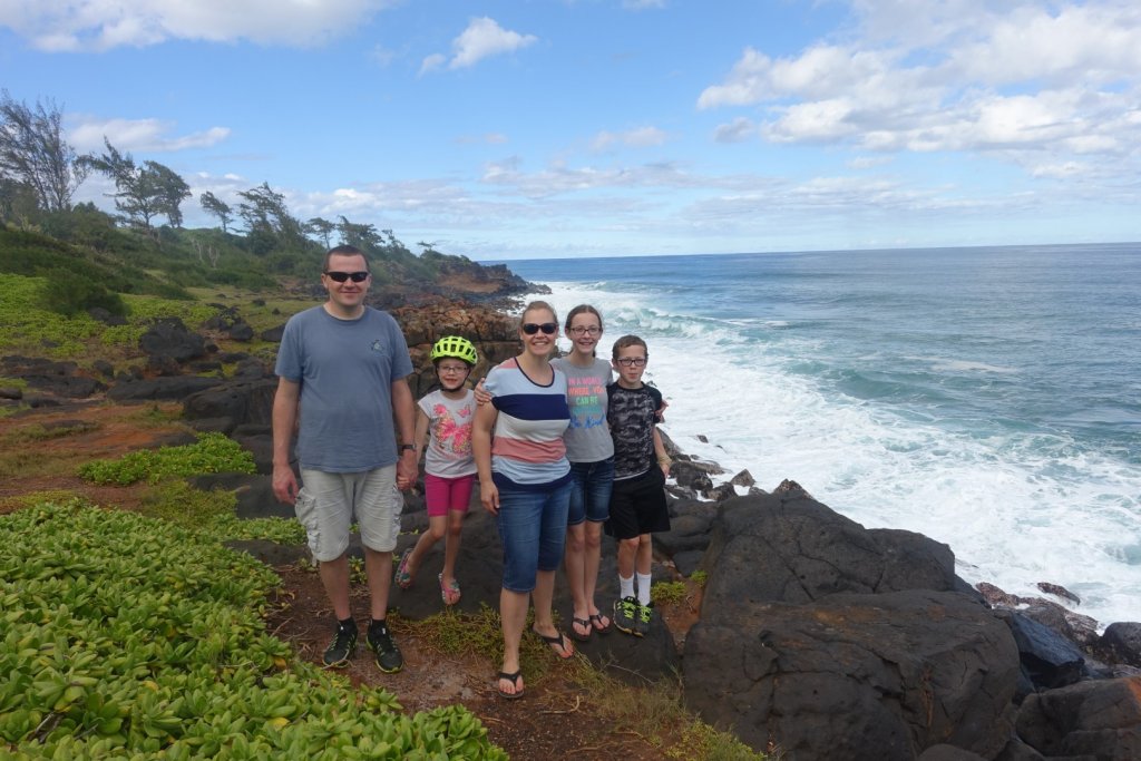 Family with ocean in the background