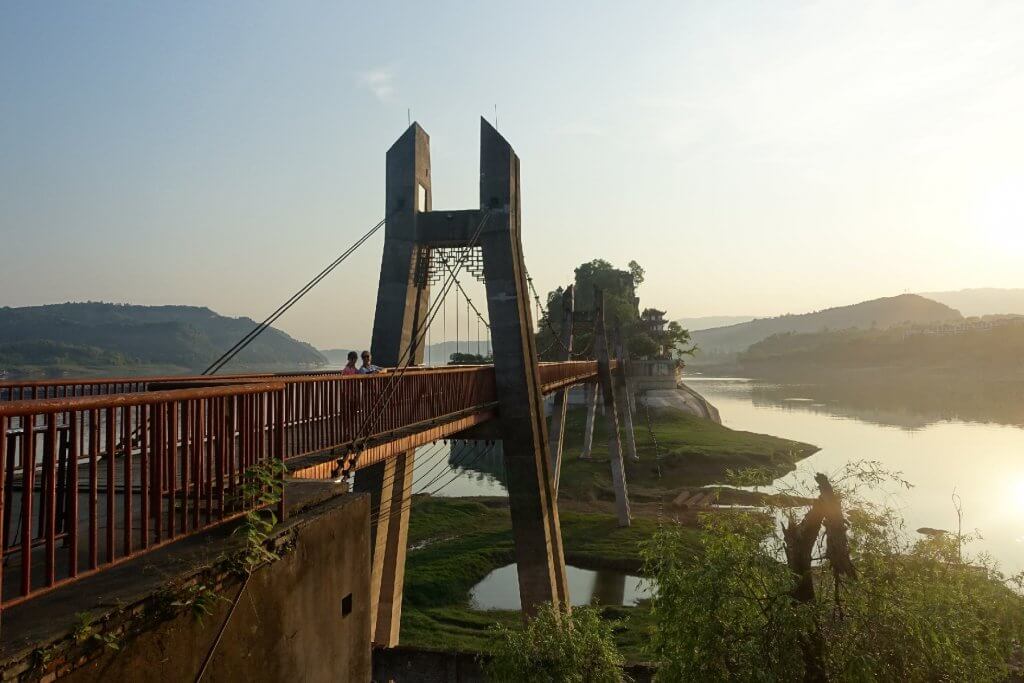 bridge with sunset in the background