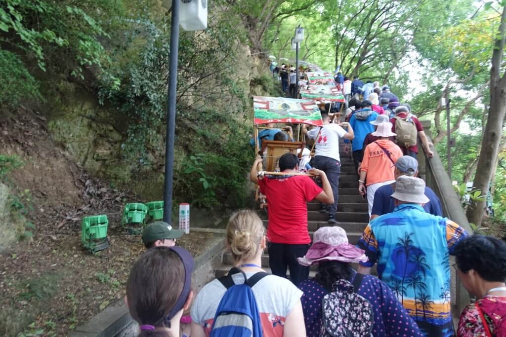 The Pagoda tour steps up the mountain