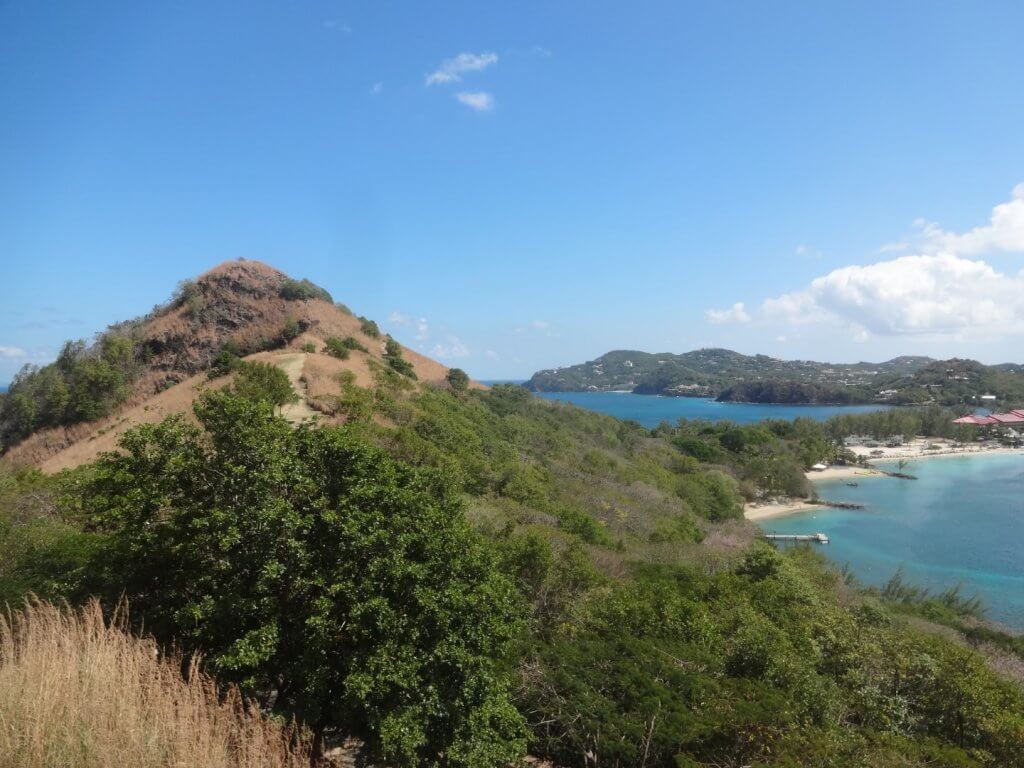 Hill with ocean in the background