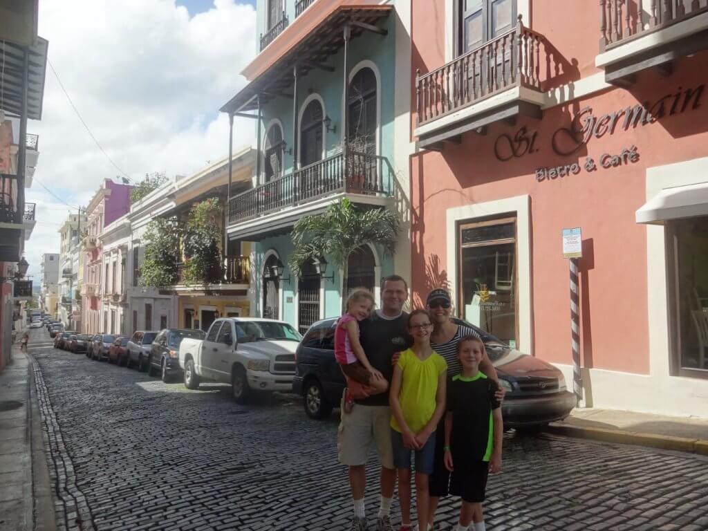 Family on a cobblestone street