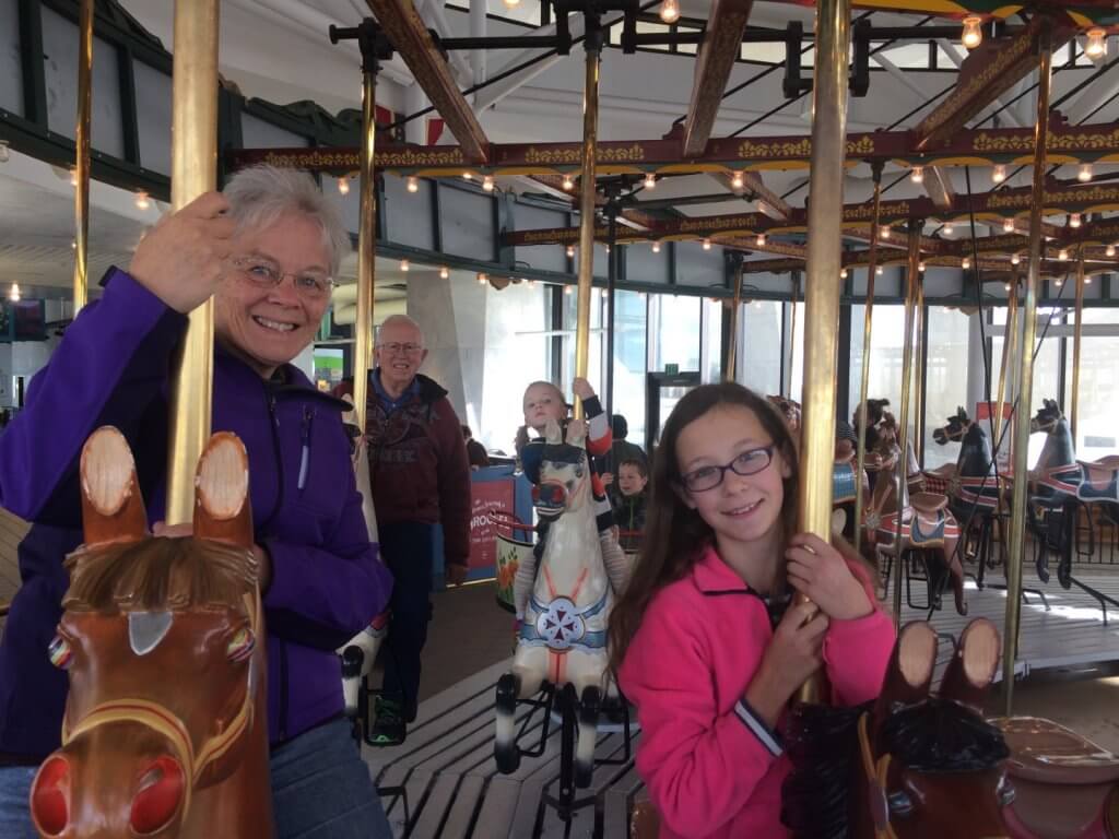 people on a carousel