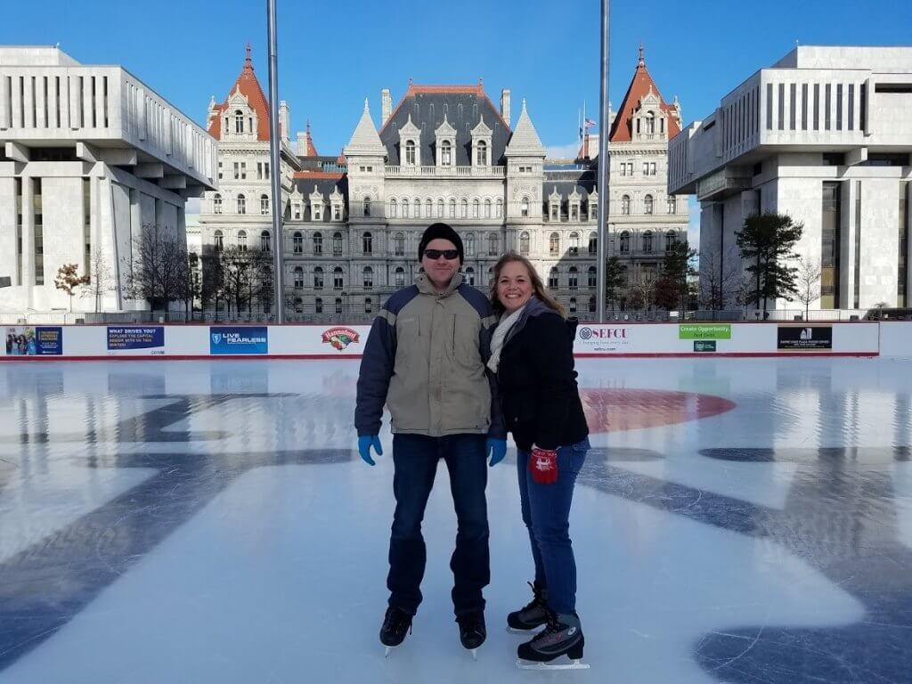 couple on ice skating rink