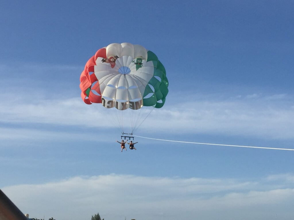 two girls parasailing