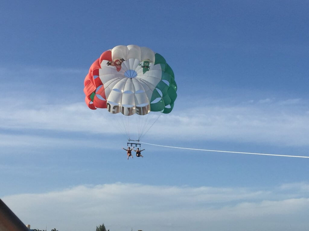 two girls parasailing