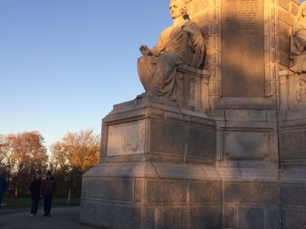 couple next to a monument