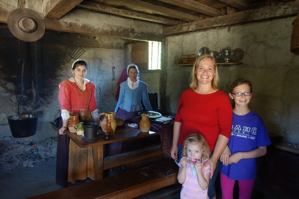 girls with period costume and tourists