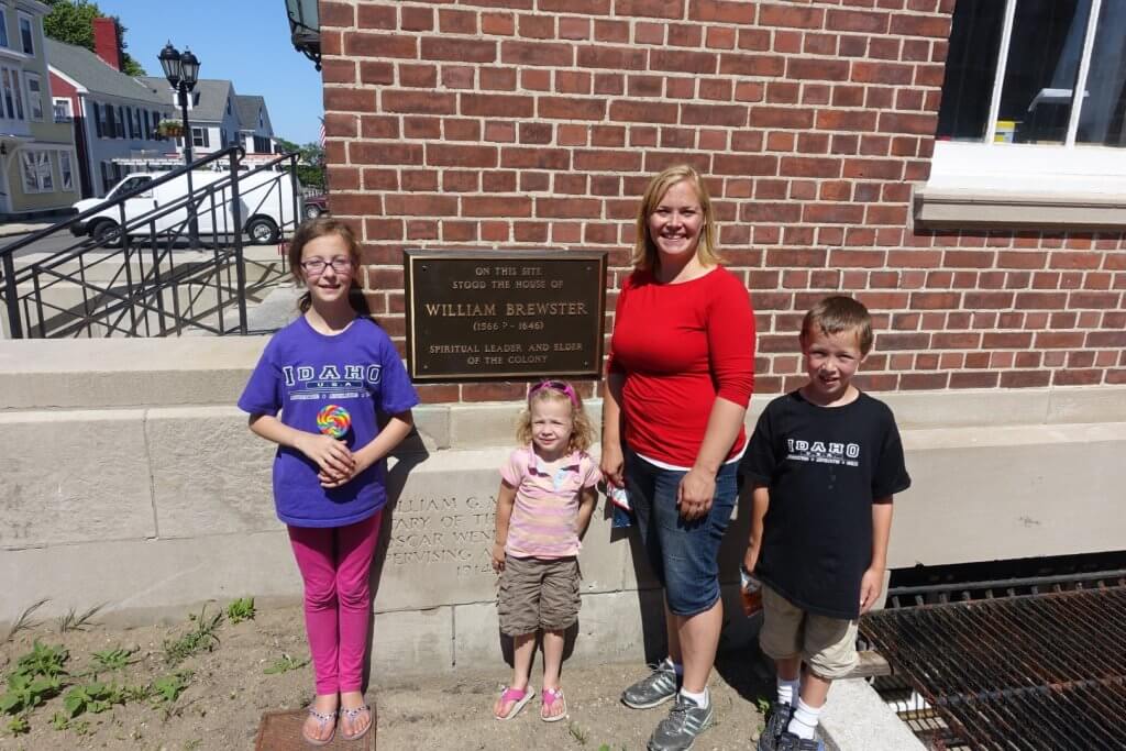 family by a plaque