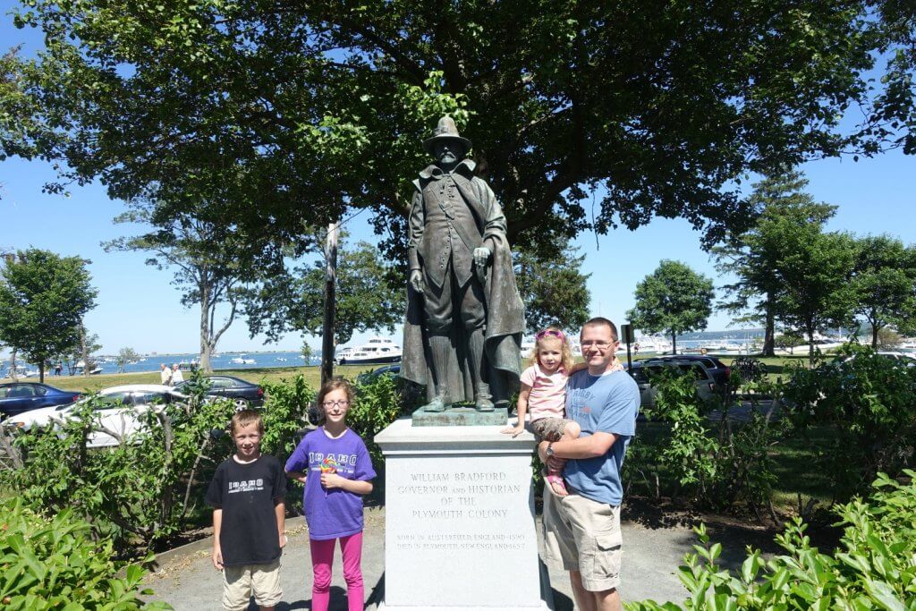 family by a statue