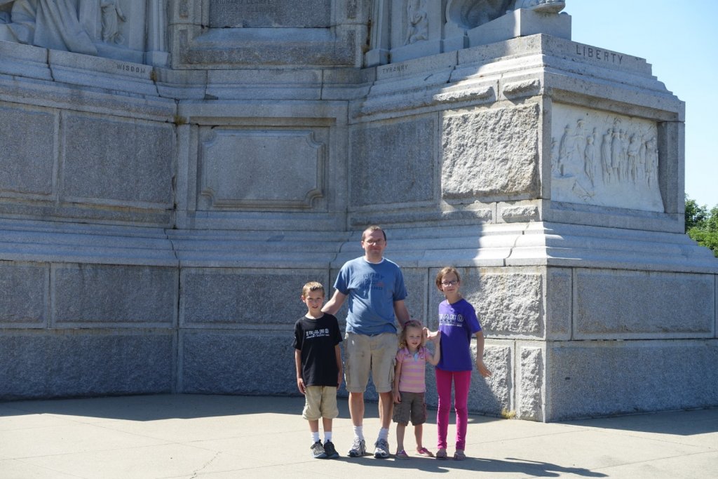 family in front of a monument