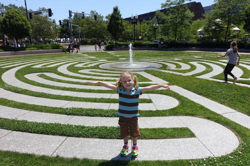 girl in front of a fountain