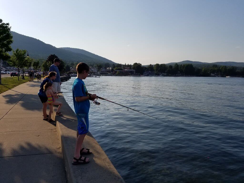 kids fishing in lake