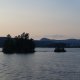 tiny island in lake at sunset