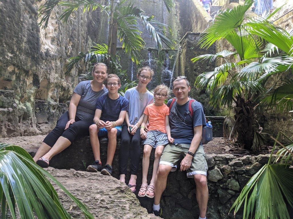 family in front of the Queen's Staircase