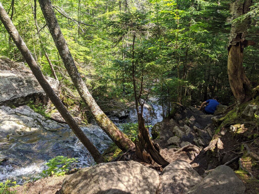 boy on rocky trail