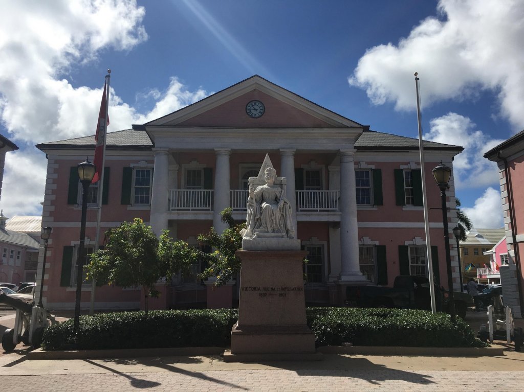 statue of queen in front of building