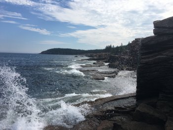 water crashing on rocks