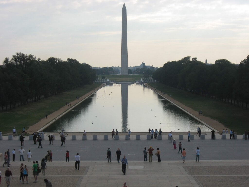 monument reflecting in pond