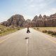 woman jumping in road