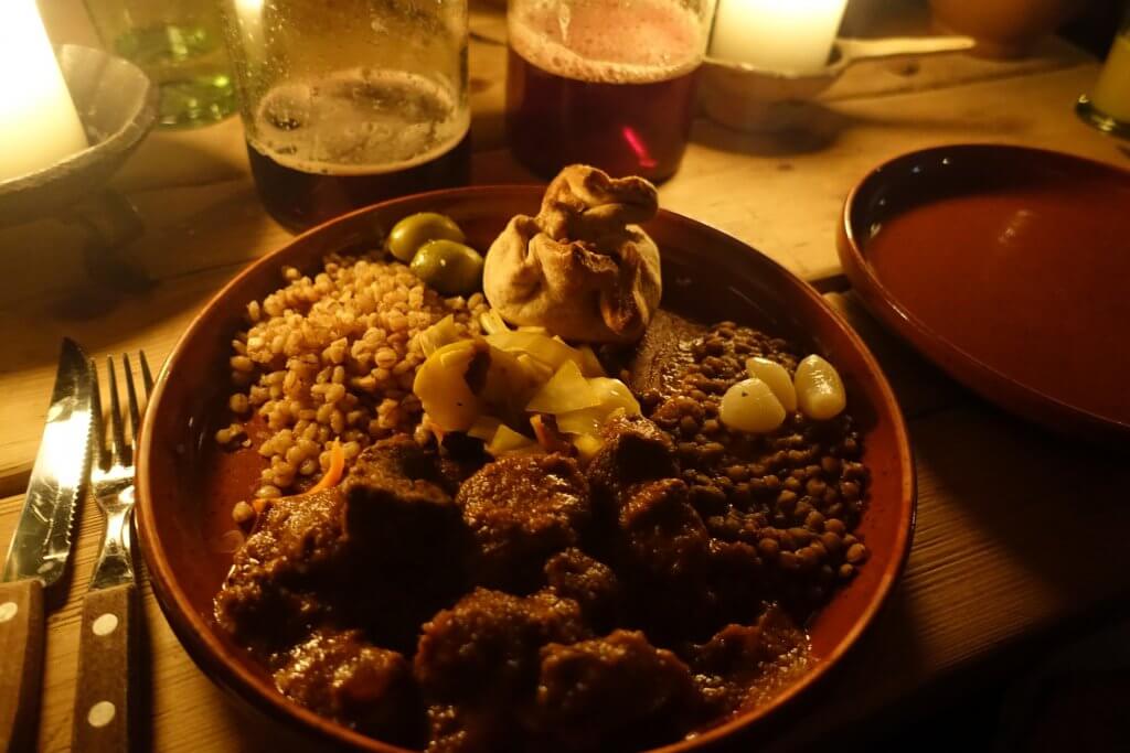 sausages, lentils, barley on a plate