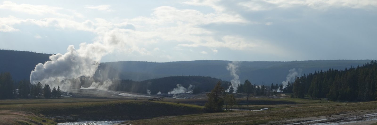 river with steam rising hot springs