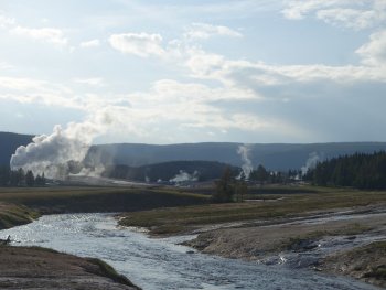 river with steam rising hot springs