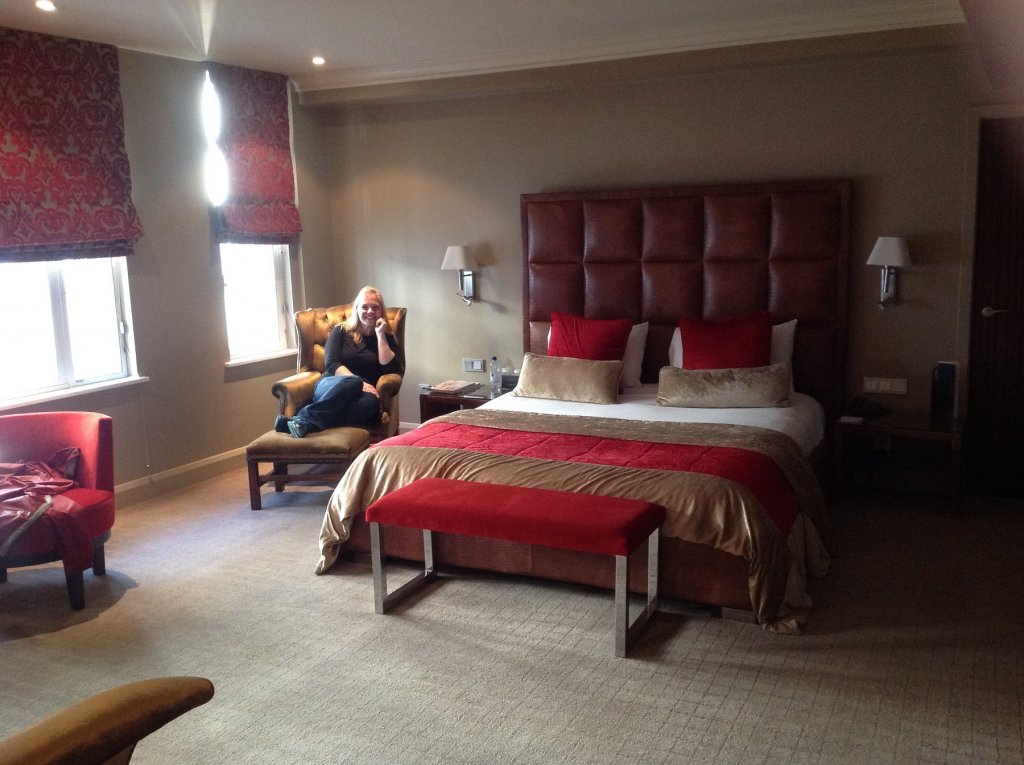 woman on a chair in hotel room