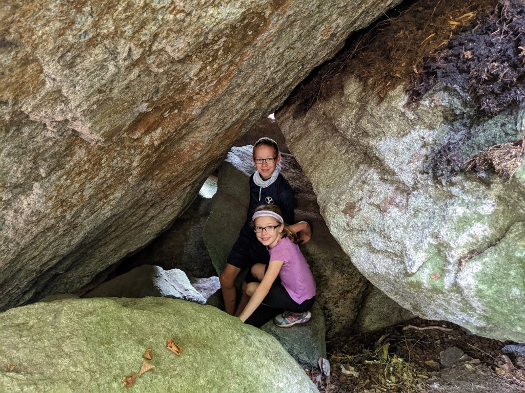 boy and girl in crevice