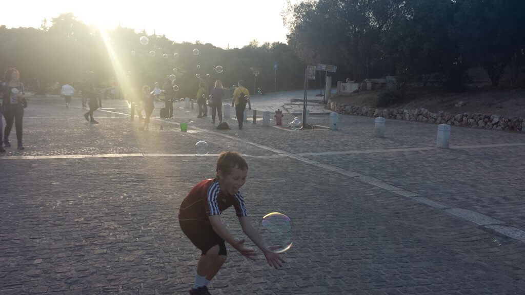 boy playing with bubble