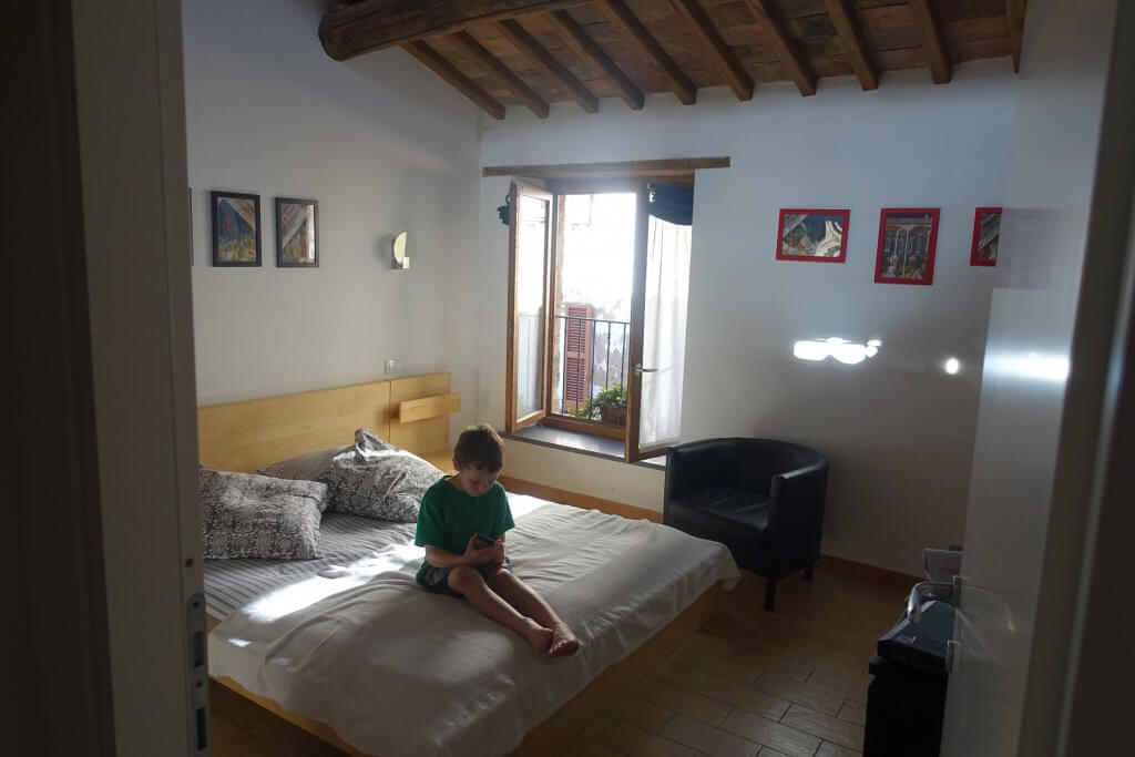 boy on a bed in apartment