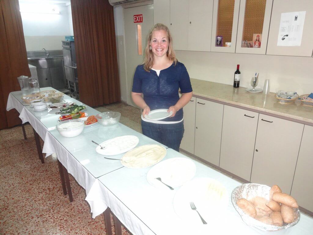 woman at table with food