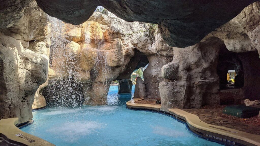 pool with caves and waterfall