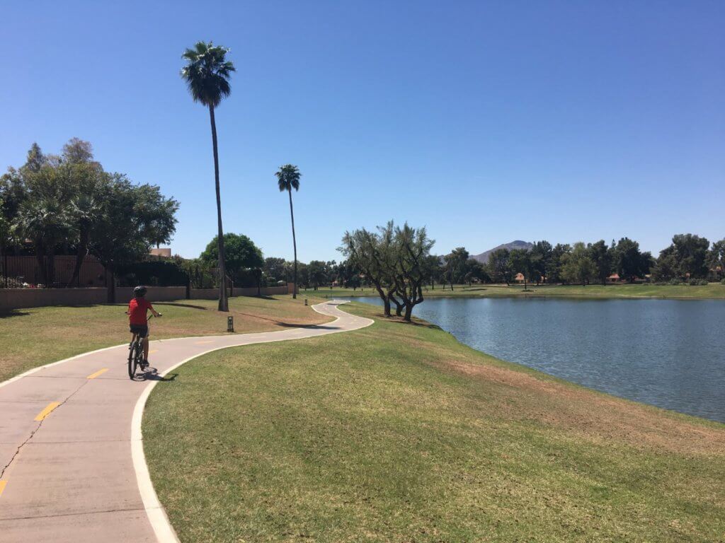 boy biking on a path