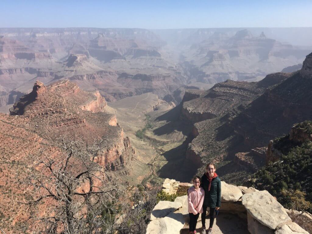 girls in front of canyon