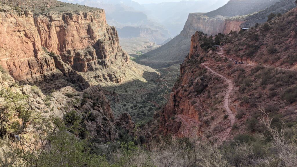 trail zig-zagging down mountainside