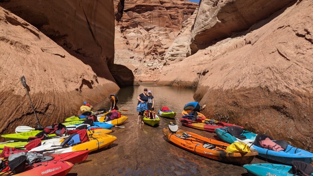 kayaks in narrow canyon