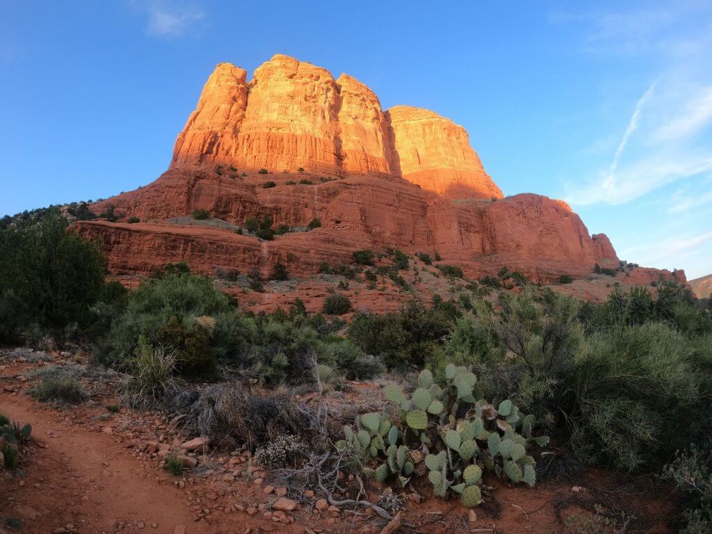 red rock mountain in sunlight