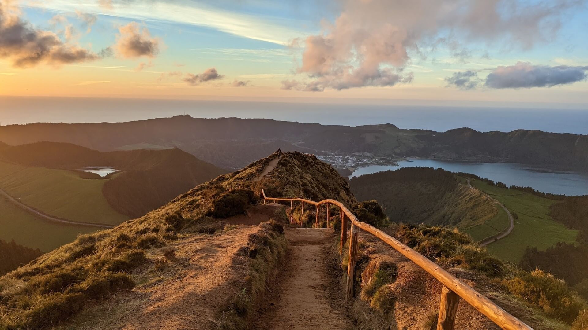 narrow trail with handrail