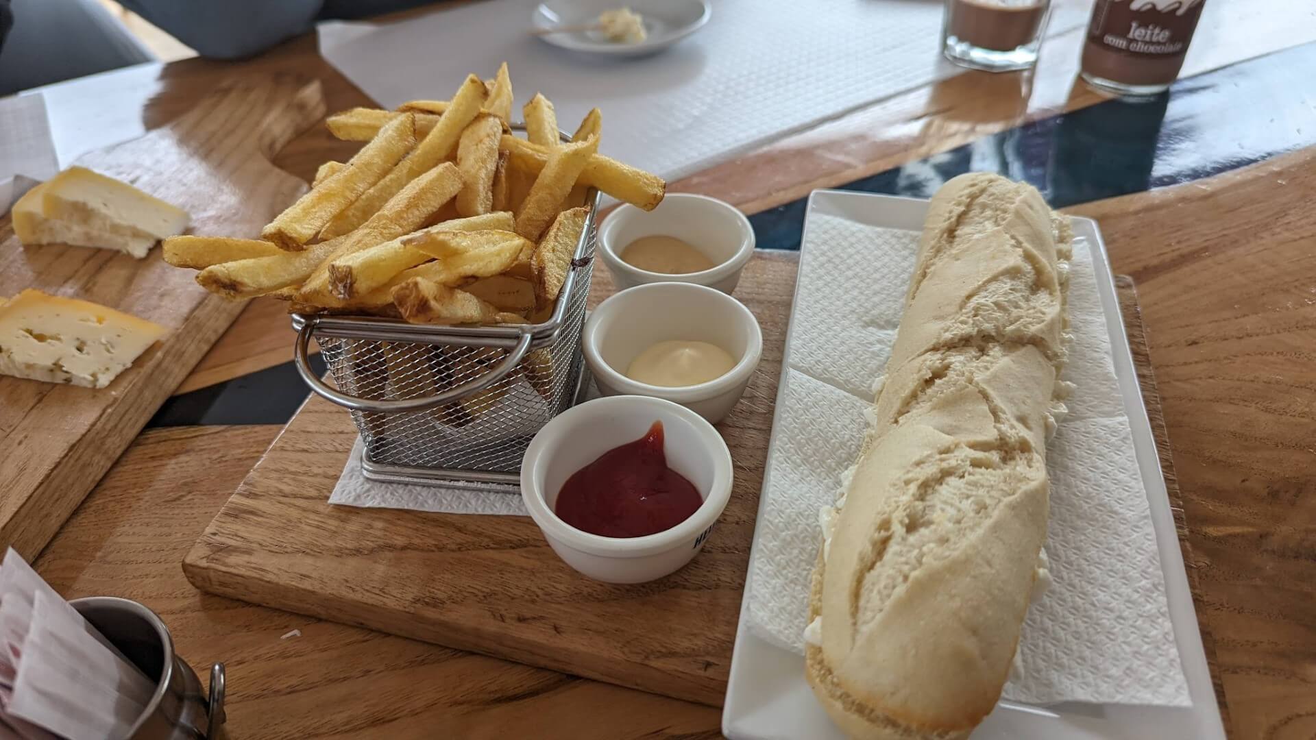 baguette and french fries with sauces